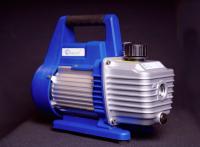 Vacuum pump for platter extractor